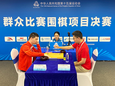 図2：男子プロ金メダルの李欽誠九段と男子アマチュア金メダルの王琛7段は、予選と決勝で2局対戦し、1勝1敗の五分に終わった。
